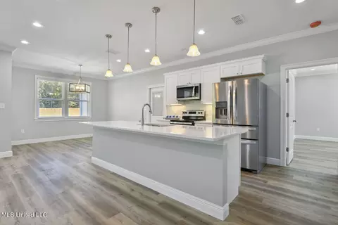 Kitchen - 7341 Ahi Dr, Diamondhead, MS 39525 photo 1 of 2