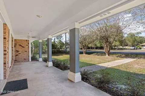 Exterior - 56114 E Diamondhead Dr, Diamondhead, MS 39525 photo 3 of 7
