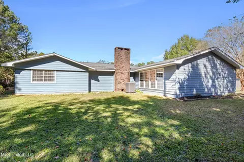 Exterior - 56114 E Diamondhead Dr, Diamondhead, MS 39525 photo 5 of 7