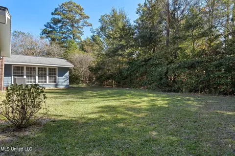 Exterior - 56114 E Diamondhead Dr, Diamondhead, MS 39525 photo 7 of 7