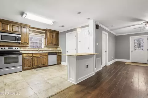 Kitchen - 18073 W 3rd St, Saucier, MS 39574 photo 2 of 6
