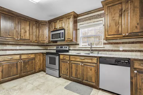 Kitchen - 18073 W 3rd St, Saucier, MS 39574 photo 3 of 6
