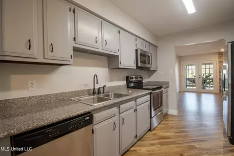 Kitchen - 211 Highpoint Dr, Diamondhead, MS 39525 photo 3 of 3