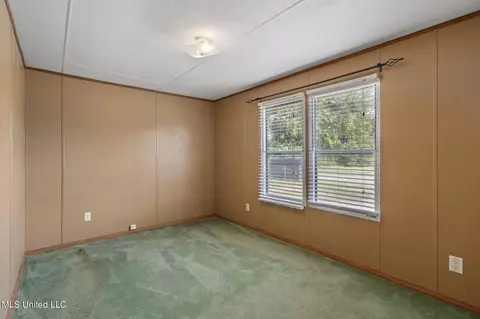Bedroom - 23066 Hegan Dr, Saucier, MS 39574 photo 4 of 5