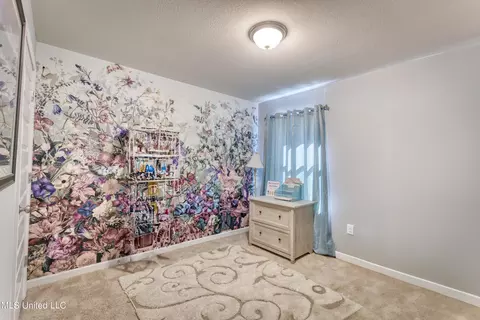 Bedroom - 606 Verbena Dr, Long Beach, MS 39560 photo 4 of 5