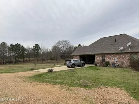 Exterior - 132 Sharon Rd, Canton, MS 39046 photo 3 of 12