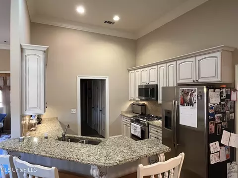 Kitchen - 300 Cedar Stone Ct, Florence, MS 39073 photo 1 of 3