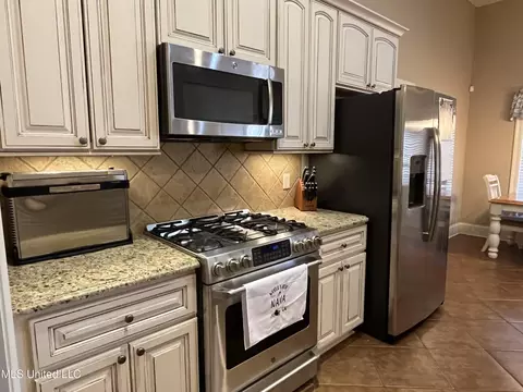 Kitchen - 300 Cedar Stone Ct, Florence, MS 39073 photo 2 of 3