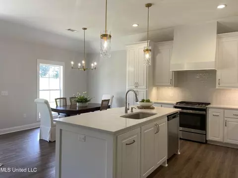 Kitchen - 506 Black Cherry Cv, Canton, MS 39046 photo 9 of 11