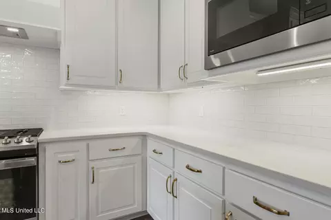 Kitchen - 506 Black Cherry Cv, Canton, MS 39046 photo 3 of 11