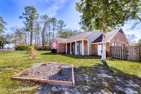 Exterior - 89337 E Diamondhead Dr, Diamondhead, MS 39525 photo 3 of 6