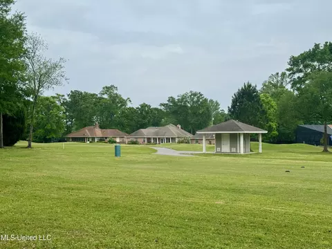 Exterior - 1 Pelican Cv, Diamondhead, MS 39525 photo 5 of 12