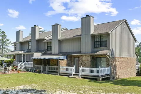 Exterior - 406 Highpoint Dr, Diamondhead, MS 39525 photo 2 of 3