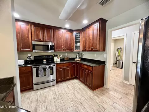 Kitchen - 9809 Pine Trl, Vancleave, MS 39565 photo 2 of 2