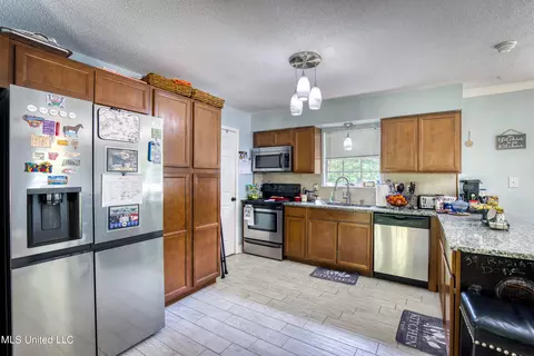 Kitchen - 26133 Airey Tower Rd, Saucier, MS 39574 photo 4 of 4