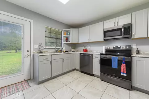 Kitchen - 18010 Pine St, Saucier, MS 39574 photo 1 of 2