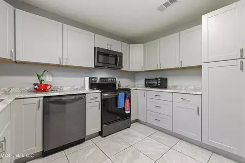 Kitchen - 18010 Pine St, Saucier, MS 39574 photo 2 of 2
