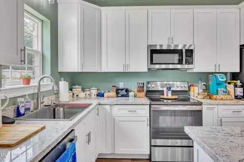 Kitchen - 515 W Border Ave, Wiggins, MS 39577 photo 2 of 3