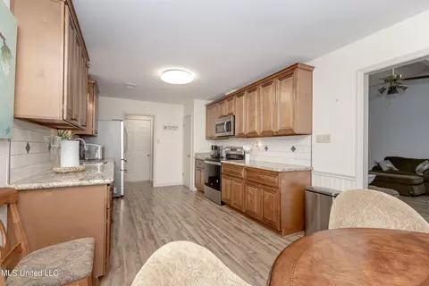 Kitchen - 8822 Oio Pl, Diamondhead, MS 39525 photo 6 of 6