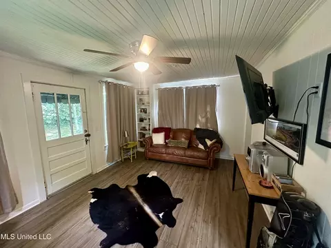 Living - 409 E Fulton St, Canton, MS 39046 photo 2 of 3