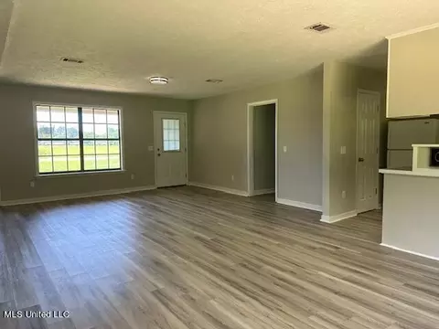 Living - 843 E Dinkins St, Canton, MS 39046 photo 9 of 11