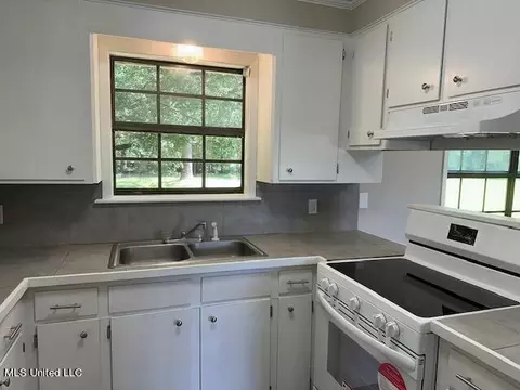 Kitchen - 843 E Dinkins St, Canton, MS 39046 photo 2 of 3