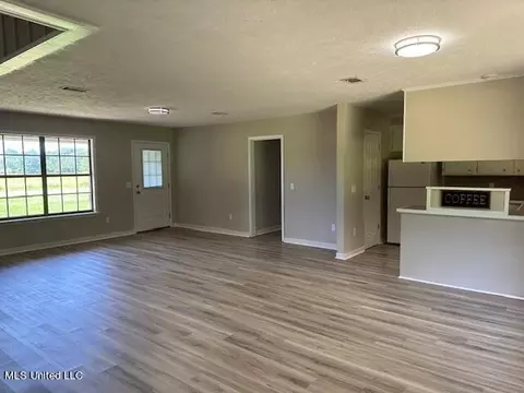 Living - 843 E Dinkins St, Canton, MS 39046 photo 7 of 11