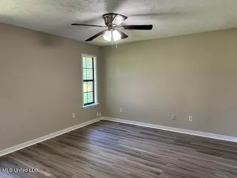 Living - 843 E Dinkins St, Canton, MS 39046 photo 11 of 11