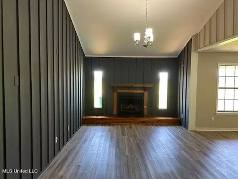 Living - 843 E Dinkins St, Canton, MS 39046 photo 5 of 11