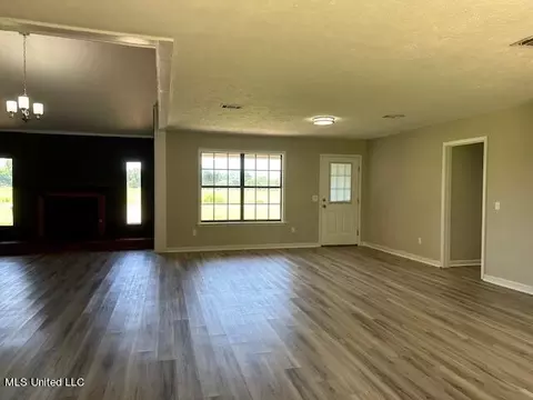 Living - 843 E Dinkins St, Canton, MS 39046 photo 8 of 11