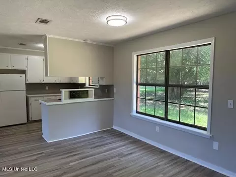 Living - 843 E Dinkins St, Canton, MS 39046 photo 10 of 11