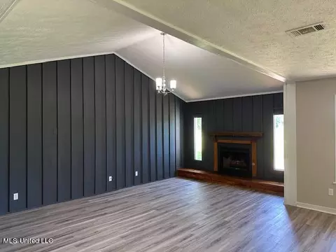 Living - 843 E Dinkins St, Canton, MS 39046 photo 2 of 11