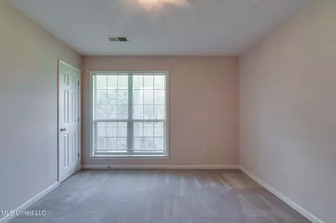 Bedroom - 5035 S Rolling Pine Cir, Olive Branch, MS 38654 photo 2 of 7