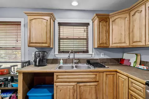 Kitchen - 24380 Wayne Bond Rd, Saucier, MS 39574 photo 2 of 3