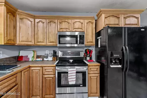 Kitchen - 24380 Wayne Bond Rd, Saucier, MS 39574 photo 3 of 3