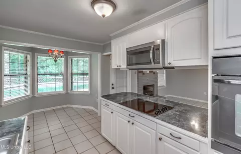 Kitchen - 601 SE Pinewood Dr, Magee, MS 39111 photo 3 of 4