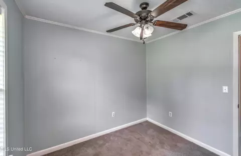 Bedroom - 601 SE Pinewood Dr, Magee, MS 39111 photo 4 of 12