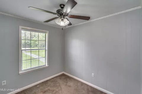 Bedroom - 601 SE Pinewood Dr, Magee, MS 39111 photo 1 of 12