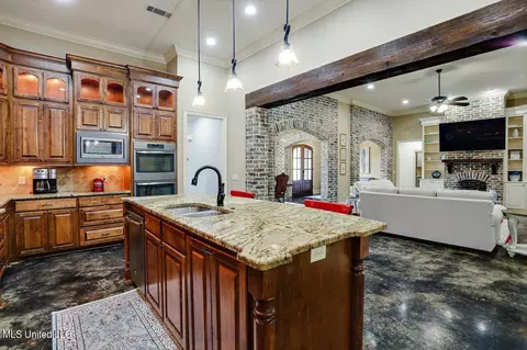 Kitchen - 910 Poplar Dr, Brandon, MS 39042 photo 2 of 3