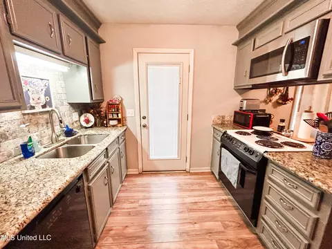 Kitchen - 223 Lewis St, Florence, MS 39073 photo 5 of 6