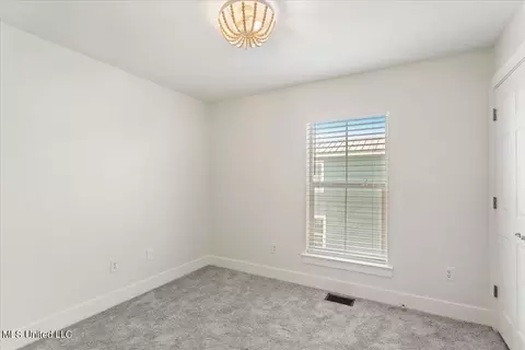 Bedroom - 215 E Second St #5, Pass Christian, MS 39571 photo 1 of 4