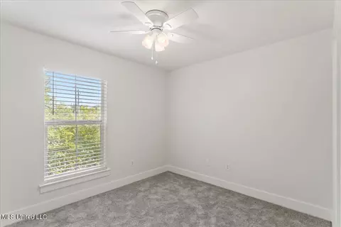 Bedroom - 215 E Second St #5, Pass Christian, MS 39571 photo 3 of 4