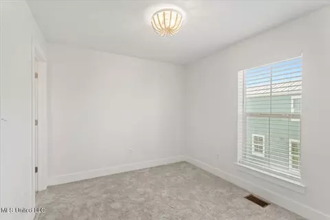 Bedroom - 215 E Second St #5, Pass Christian, MS 39571 photo 2 of 4