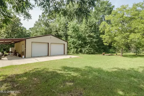 Exterior - 4008 Sentinel Dr, Escatawpa, MS 39552 photo 5 of 10