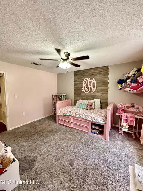 Bedroom - 1108 Sampson Rd, Lucedale, MS 39452 photo 4 of 8