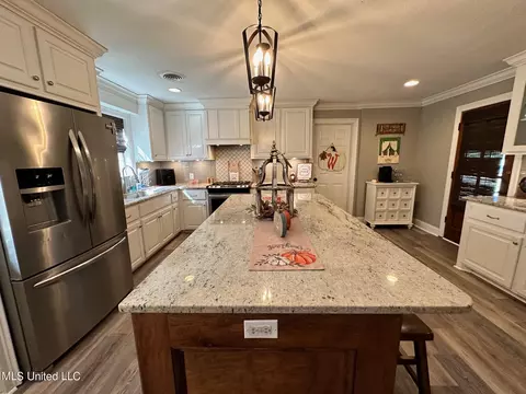 Kitchen - 1408 E Peace St, Canton, MS 39046 photo 5 of 8