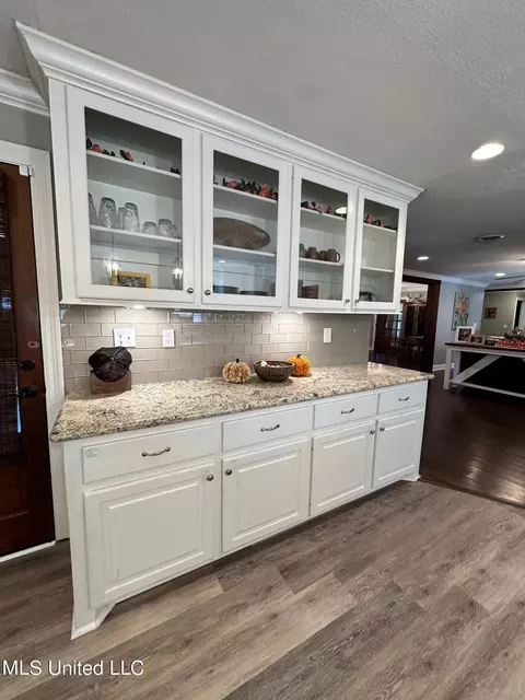 Kitchen - 1408 E Peace St, Canton, MS 39046 photo 7 of 8