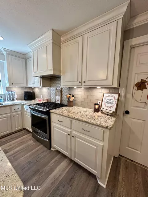 Kitchen - 1408 E Peace St, Canton, MS 39046 photo 2 of 8