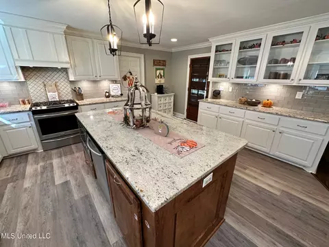 Kitchen - 1408 E Peace St, Canton, MS 39046 photo 4 of 8