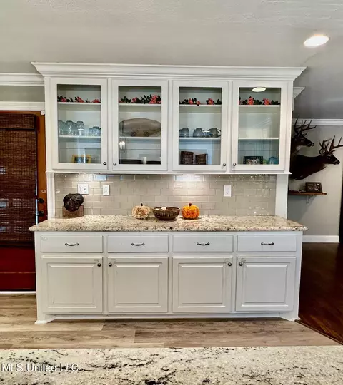 Kitchen - 1408 E Peace St, Canton, MS 39046 photo 6 of 8